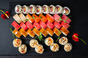 Poster - sushi on the black background