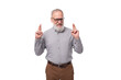 © Ivan Traimak - 60 year old elderly business man with mustache and gray beard wearing glasses looks stylish and modern