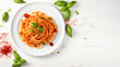Pasta fettuccine with tomato sauce with parmesan