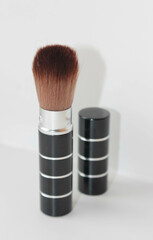 Makeup brush on white background