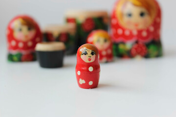 Little matryoshka on a white background