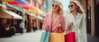 © LightoLife - Stylish ladies wearing trench coat and sunglasses walking with shopping bags near the store,  consumerism concept