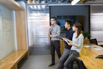 IT workers having a meeting in board room
