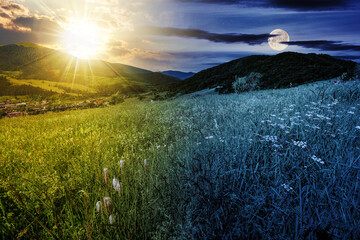 Wall Mural - mountainous rural landscape with pasture. herbs on hill and sun and moon on the sky at summer solsti