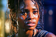 Portrait of a young black woman with wet hair and face, looking desperate