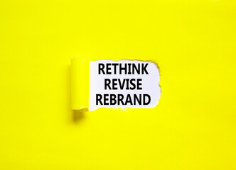 Wall Mural - Rethink revise rebrand symbol. Concept word Rethink Revise Rebrand on beautiful white paper. Beautiful yellow table background. Business brand motivational rethink revise rebrand concept. Copy space.