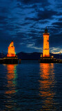 Fototapeta Na ścianę - lighthouse at dusk, Lindau harbor, Germany
