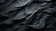 An enigmatic masterpiece, the dark fabric undulates with intricate waves, evoking a sense of mystery and depth within the abstract design