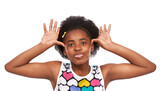 Fototapeta  - Goofy, funny and portrait of black girl in a studio with tongue out for crazy facial expression. Comedy, joke and young African child with tease, comic and silly face isolated by white background.