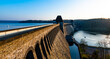 Möhne dam reservoir panorama “Möhnesee“ with massive stone dam near Soest in Sauerland, Germany. It was breached by British Bombers in WW II. Tourist attraction, recreation area in natural reserve.