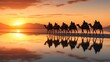 Caravan of camels on the salt lake at sunrise.