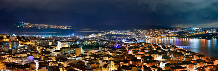 Wall Mural - Gemlik district aerial view.  Gemlik Bursa Turkey. December 10 2023. Panoramic view of Gemlik district before the earthquake. Turkey's most earthquake-prone region. Gemlik district night view.
