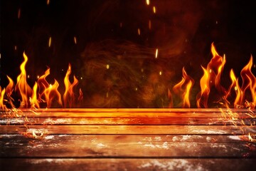 Wall Mural - wooden table with burning Fire sparks