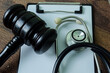 Black Judges gavel and Stethoscope. Healthcare or Medical jurisprudence. Medical Law