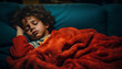 Retrato en primer plano de un niño durmiendo en un sofá.