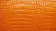 Orange crocodile leather texture.