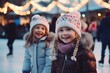 Two little girls standing next to each other on a skating rink. Suitable for winter sports and family activities