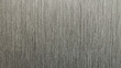 Grey background with  woven cloth texture with a vertical pattern