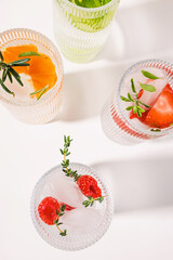 Wall Mural - Infused waters with different flavors, summer refreshing drinks