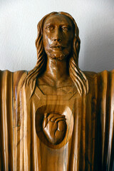 Wall Mural - Sacred Heart church. Wood statue of Jesus sacred heart.  Sion. Switzerland.