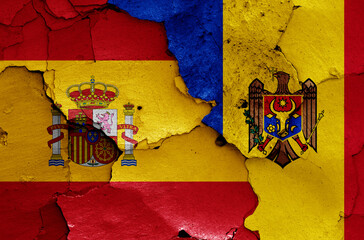 Wall Mural - flags of Spain and Moldova painted on cracked wall