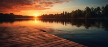 Sunset Next To Lake On Wooden Platform