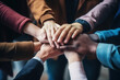 © fotoworld - Team Unity with Stacked Hands Signifying Togetherness
