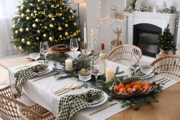 Wall Mural - Christmas table setting with festive decor and dishware in living room