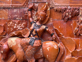 Wall Mural - statue of hindu god on the wall of the temple.