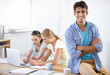 © Duncan M/peopleimages.com - Business portrait of happy man at desk with team, laptop and paperwork at coworking accounting office. Happy startup, manager and women on website for admin documents at online tax consulting agency.