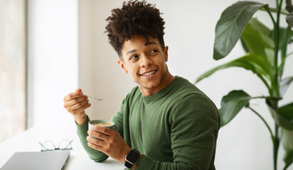 Wall Mural - Handsome young black guy freelancer have coffee break