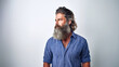 © Alfonso Soler - A bearded man shows off his good looks as he stands in a studio against a white backdrop