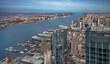 Aerial view of New York City skyline over the Hudson River.