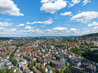 Wall Mural - Aerial view of Swiss City of Zürich on a blue cloudy summer day. Photo taken July 20th, 2023, Zurich, Switzerland.