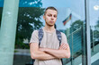 © Valerii Honcharuk - Portrait of confident college student guy, outdoor