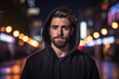 © Marco Attano - young man with a modern haircut, stubble beard, black hoodie, urban street at night, neon sign reflections