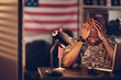© Marko Geber - American soldier being tired and missing home while being deployed in an army base