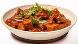 Fototapeta  - Delicious Indian Vindaloo Curry with Pork on White Background AI Generated