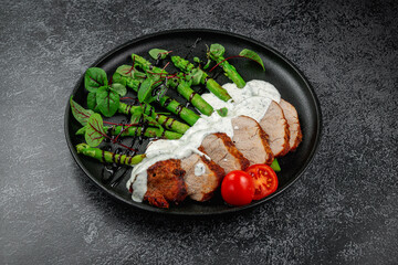 Wall Mural - Roasted green asparagus with sliced beef meat in layers