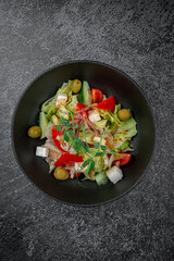 Canvas Print - Caesar salad with croutons, cherry tomatoes, olives, cucumber and red onion