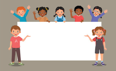 Poster - Group of kids students boys and girls standing behind empty banner or poster templates for text banner and ads