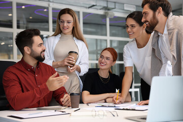 Sticker - Team of employees working together in office