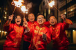 Group of young chinese people celebrating in red traditional costumes a new year of green dragon 2024