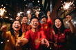 Group of young chinese people celebrating in red traditional costumes a new year of green dragon 2024
