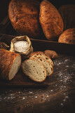 Fototapeta Tulipany - Whole and sliced breads