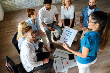 Wall Mural - Diverse business people in office during brainstorming while discussing ideas for their new project.