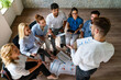 © NDABCREATIVITY - Successful happy group of people learning software engineering and business during presentation