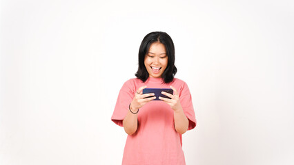 Happy asian woman playing game using mobile phone isolated on a white background.