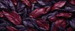 Luxurious Burgundy and Plum Fabric Leaves Intertwined in a Rich Textured Abstract Design