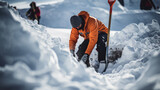 Fototapeta  - Rescuer digging through snow in search and rescue operation